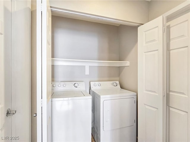 washroom with laundry area and independent washer and dryer