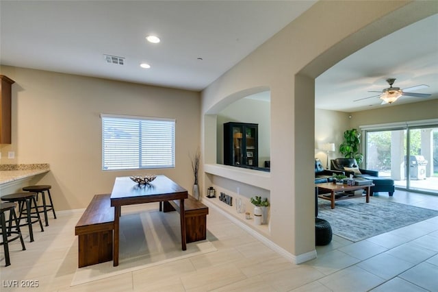 dining space featuring light tile patterned floors, visible vents, baseboards, recessed lighting, and ceiling fan