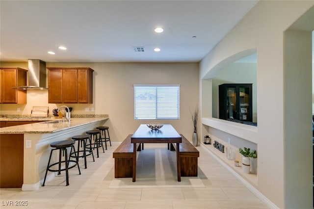 dining room featuring recessed lighting, visible vents, and baseboards