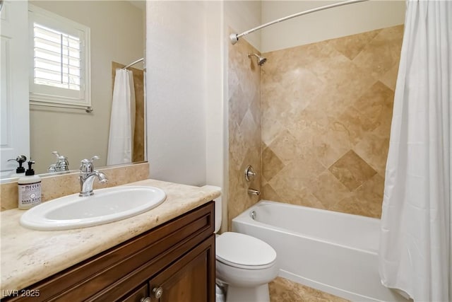 full bath with vanity, toilet, and shower / bath combo with shower curtain