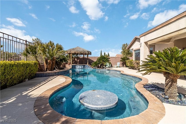 view of swimming pool featuring a gazebo, a patio area, a fenced in pool, and a fenced backyard