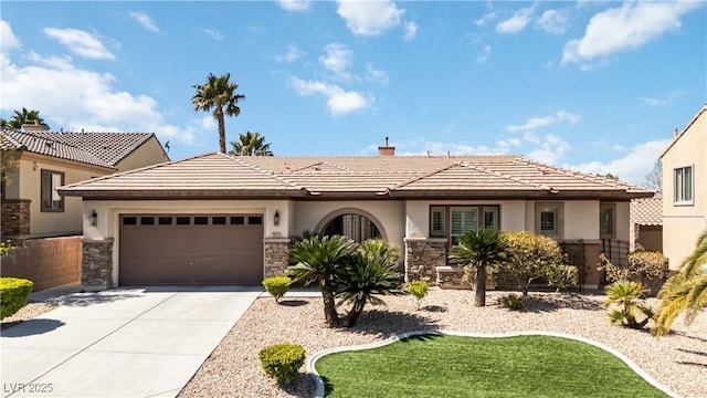 view of front facade featuring stone siding, stucco siding, driveway, and a garage