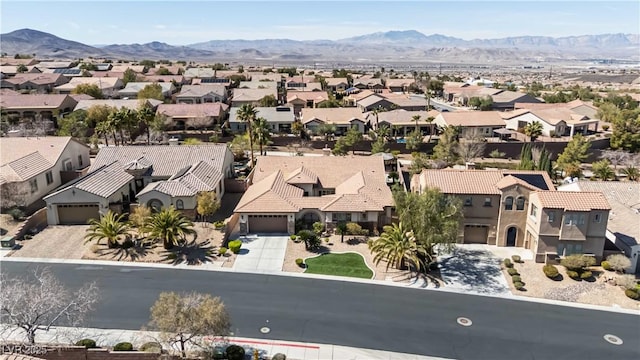 bird's eye view featuring a mountain view and a residential view