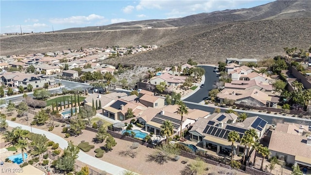 bird's eye view featuring a mountain view and a residential view