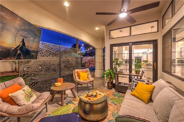 view of patio / terrace featuring ceiling fan, outdoor lounge area, and fence