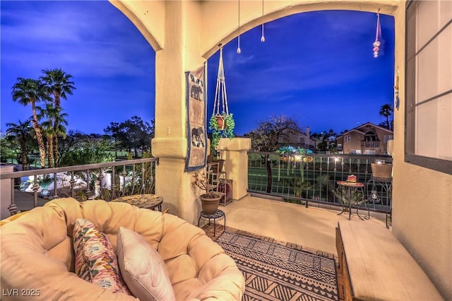 balcony with an outdoor hangout area