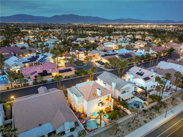 bird's eye view featuring a mountain view and a residential view