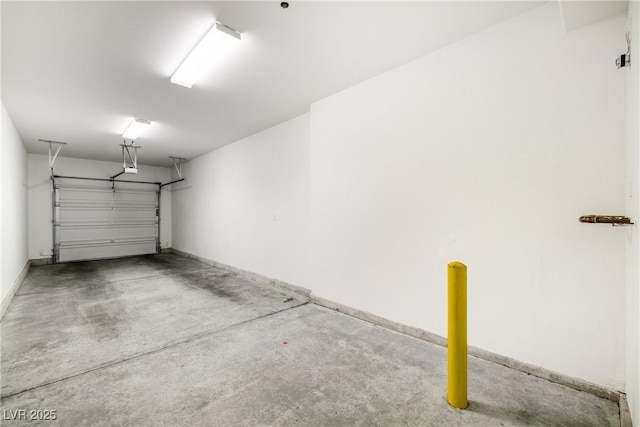 garage with baseboards