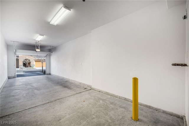 garage with baseboards