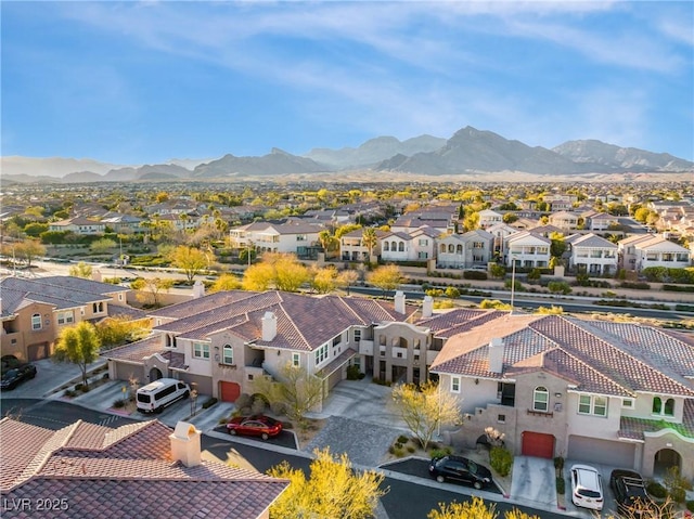 birds eye view of property featuring a residential view and a mountain view