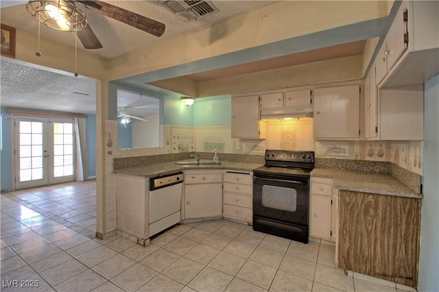 kitchen with a sink, decorative backsplash, black electric range, under cabinet range hood, and dishwasher