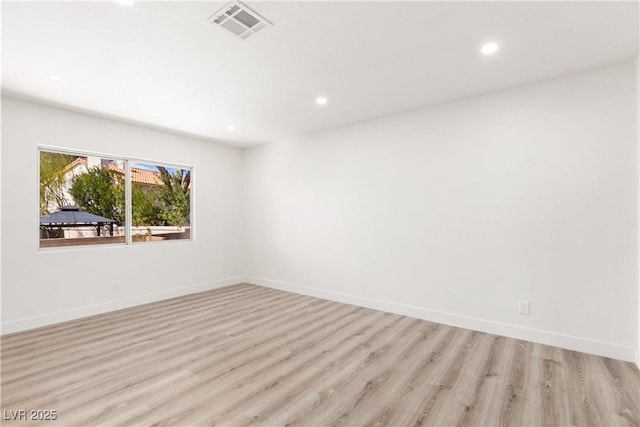3021 Ocean Port Dr, Las Vegas, NV 89117 - unfurnished room featuring recessed lighting, baseboards, visible vents, and light wood finished floors
