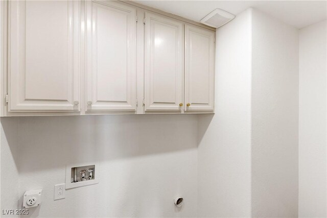 clothes washing area featuring hookup for a gas dryer, cabinet space, visible vents, and hookup for a washing machine