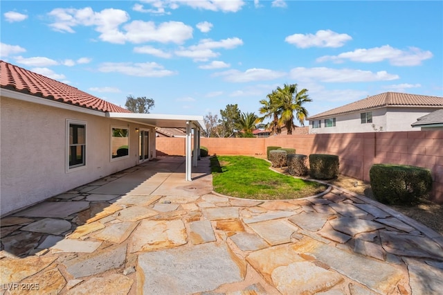 view of patio featuring a fenced backyard