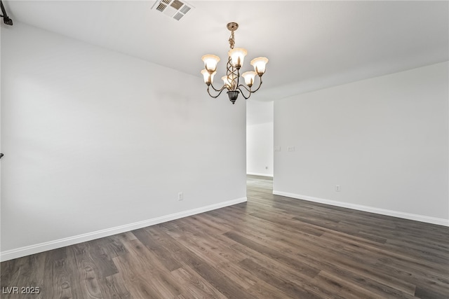 206 Lynbrook St, Henderson, NV 89012 - unfurnished room with a chandelier and dark wood finished floors