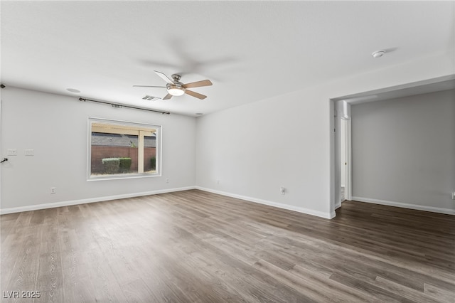 206 Lynbrook St, Henderson, NV 89012 - unfurnished room featuring a ceiling fan, wood finished floors, and a smoke detector