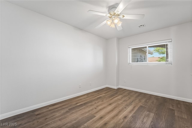 206 Lynbrook St, Henderson, NV 89012 - spare room with dark wood-style flooring and ceiling fan