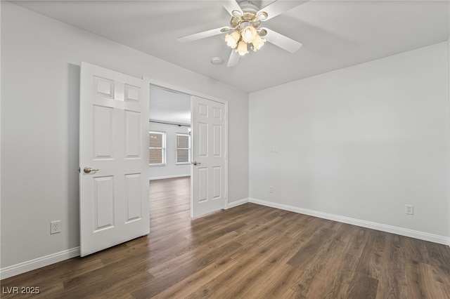 206 Lynbrook St, Henderson, NV 89012 - unfurnished bedroom with dark wood-style floors and a ceiling fan