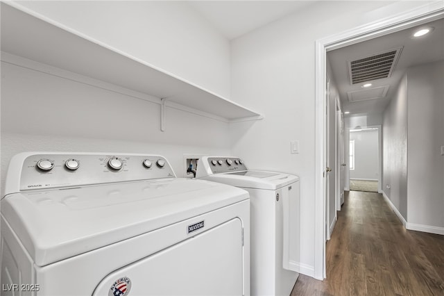 206 Lynbrook St, Henderson, NV 89012 - laundry area with separate washer and dryer, dark wood-style floors, and recessed lighting