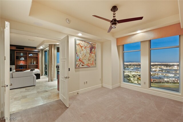 spare room with recessed lighting, baseboards, carpet floors, and a ceiling fan