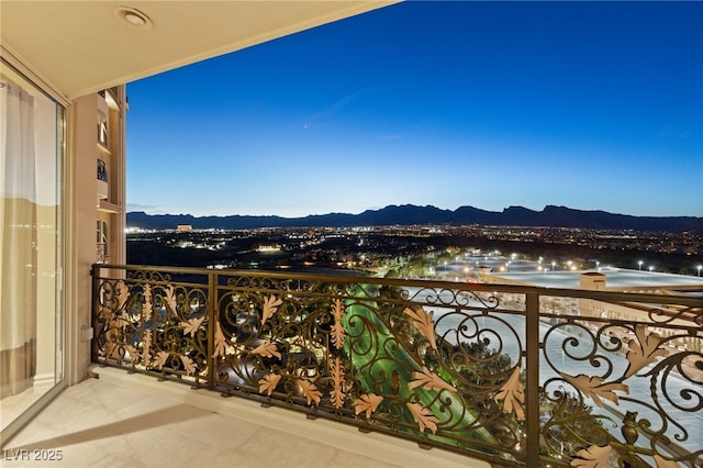 balcony featuring a mountain view