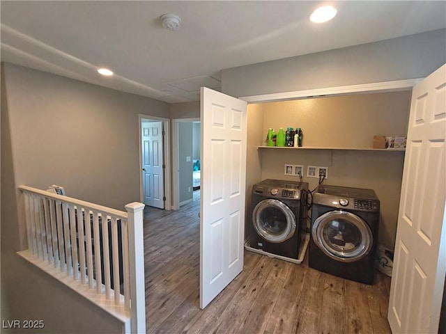 clothes washing area with laundry area, recessed lighting, wood finished floors, and separate washer and dryer