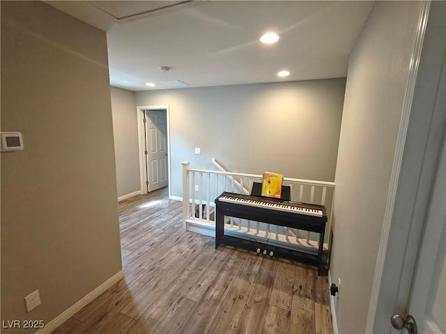 bedroom featuring recessed lighting, baseboards, and wood finished floors