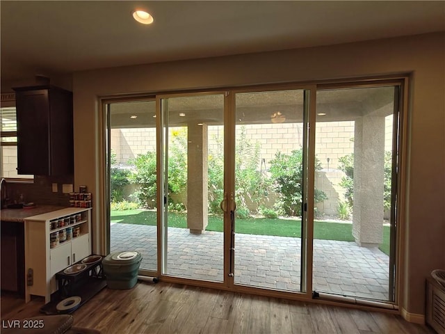 entryway featuring recessed lighting and wood finished floors