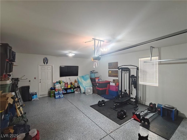 workout room with a garage