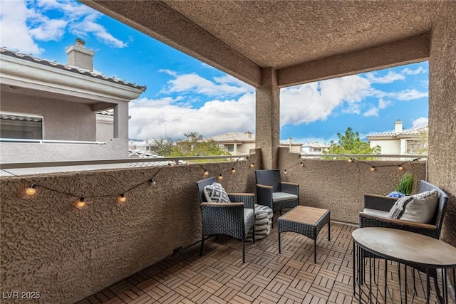 balcony featuring a sunroom