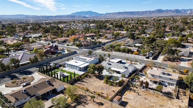 birds eye view of property with a residential view and a mountain view