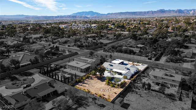 aerial view featuring a mountain view and a residential view