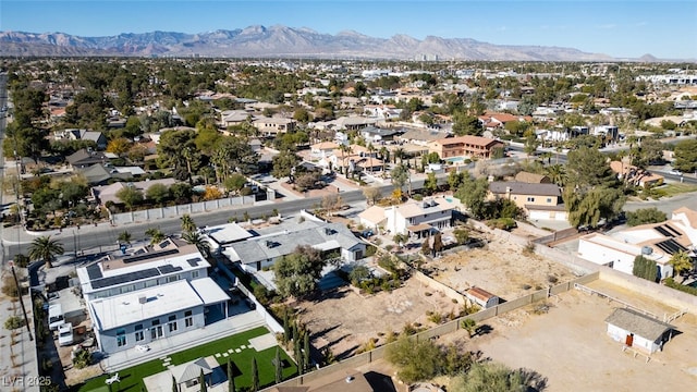 birds eye view of property with a residential view and a mountain view