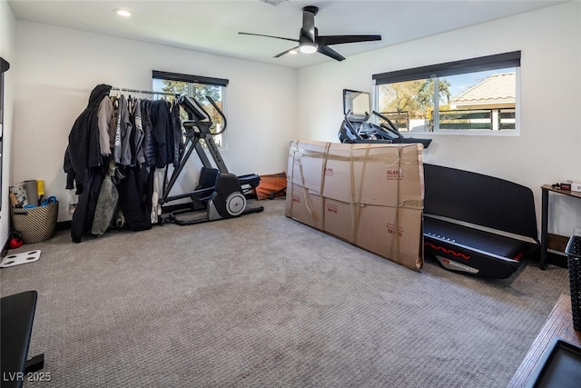 interior space featuring ceiling fan, recessed lighting, a wealth of natural light, and light carpet