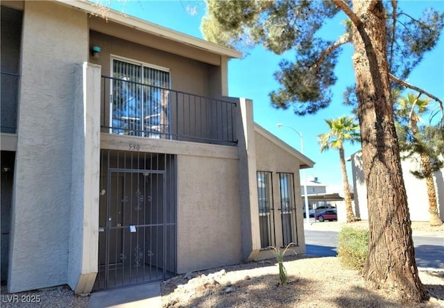 exterior space featuring stucco siding