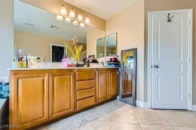 reception area with visible vents and a sink