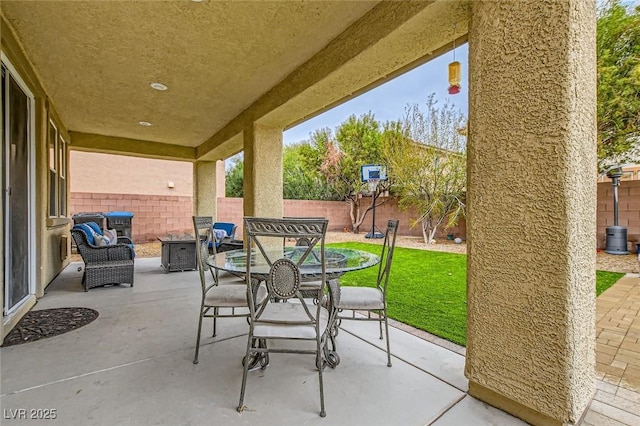 view of patio / terrace featuring outdoor dining area and a fenced backyard