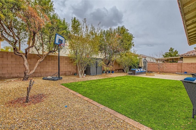 view of yard with a fenced backyard and a patio area