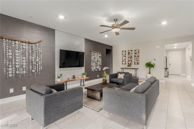 living room with recessed lighting, baseboards, a ceiling fan, and light tile patterned floors