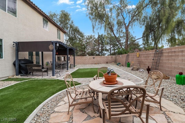 view of patio featuring outdoor dining area, a fenced backyard, a pergola, and grilling area