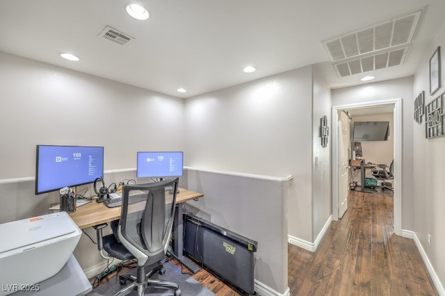 home office featuring recessed lighting, visible vents, baseboards, and wood finished floors