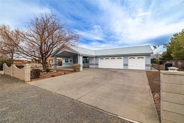 single story home featuring fence, a tiled roof, stucco siding, driveway, and an attached garage