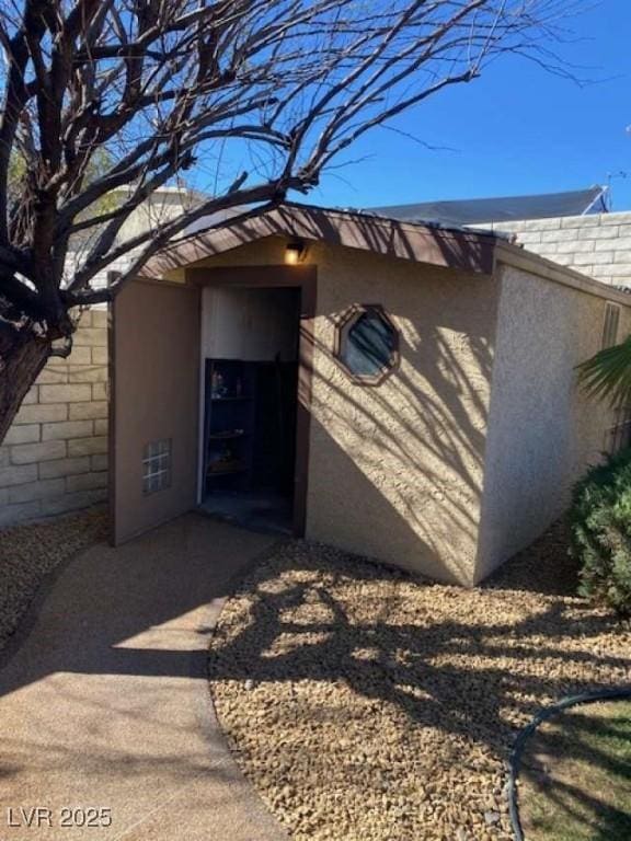 exterior space with stucco siding