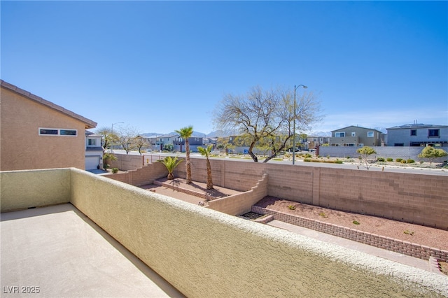 balcony featuring a residential view