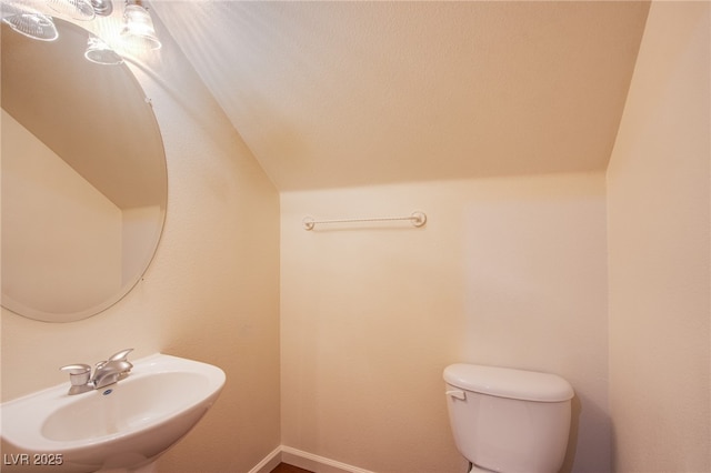 bathroom featuring a sink and toilet