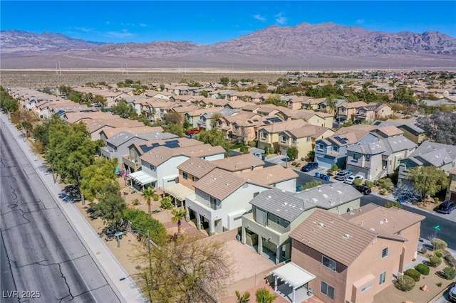 aerial view with a mountain view and a residential view