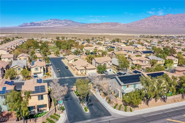 aerial view featuring a mountain view and a residential view