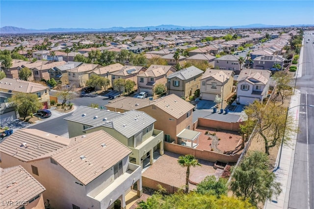 aerial view with a mountain view and a residential view