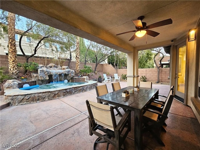 view of patio with outdoor dining space, ceiling fan, an outdoor pool, and a fenced backyard