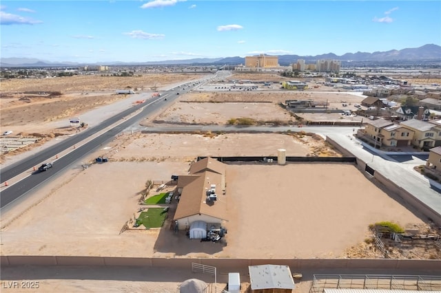 bird's eye view featuring view of desert and a mountain view